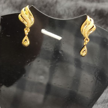 Earrings by Aaj Gold Palace